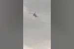 Askeri helikopter dolu ve yağmura yakalandı
