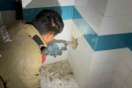 Bacadan düşerek mahsur kalan yavru kedi duvarın kırılmasıyla kurtarıldı
