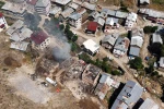 Bayburt’ta çıkan yangında hasar gören 5 ev ve 3 samanlık havadan görüntülendi