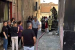 Bina girişindeki odunluk alev aldı 