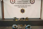 Çatı katında yapılan aramada uyuşturucu ve silah ele geçirildi