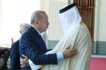 Cumhurbaşkanı Erdoğan, Katar'da resmi törenle karşılandı