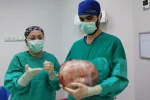Karnı 2 ayda 9 aylık hamile gibi büyüyen kadının içinden karpuz kadar kitle çıkarıldı