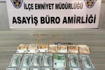 Kendisini komiser olarak tanıtıp altın ve dövizleri almaya geldi, suçüstü yakalandı