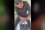 Klima ünitesinin boru hattında yakaladığı yılanı "Sevgili yılan insanlardan uzak dur, yoksa ne yaparlar biliyorsun" diyerek doğaya saldı