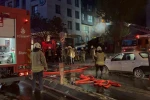 Motosiklet alev aldı, alevler 4 katlı binayı ve girişteki iş yerini sardı