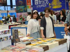 9 aylıkken geldikleri kitap fuarının 14 yıllık müdavimi oldular
