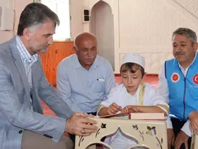 Amasya’da 9 yaşındaki otizmli Asilhan, Kur’an-ı Kerim okumayı öğrendi
