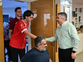 Başkan Yılmaz şampiyonları ağırladı
