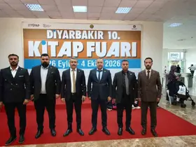 MHP Diyarbakır İl Başkanı Özcoşkun ve yönetimi, Kitap Fuarını gezdi
