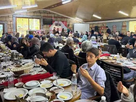 MHP Kemalpaşa, şehit aileleri ve gazilerle buluştu
