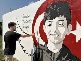 Okul saldırısında hayatını kaybeden Adnan’ın portresi memleketinde duvara çizildi

