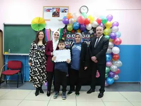 Şehidin oğlu ilk karnesini Bakan Göktaş’ın elinden aldı
