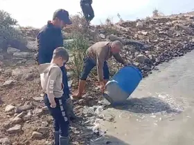 Sulama kanallarında mahsur kalan balıklar kurtarıldı

