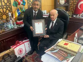 Teşkilat binasının tapusunu Genel Başkan Devlet Bahçeli’ye takdim ettiler