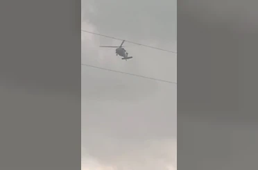 Askeri helikopter dolu ve yağmura yakalandı 