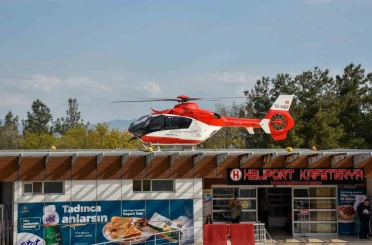 Baygın haldeki genç kızın yardımına ambulans helikopter yetişti 