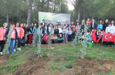 Burhaniye’de 400 fidan toprakla buluştu 