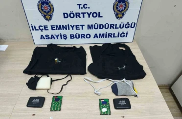 Hatay’da ehliyet sınavına kopya düzeneği ile giren iki kardeş yakalandı 