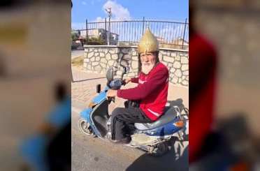 Kask yerine miğfer takan dede görenleri şaşırttı 