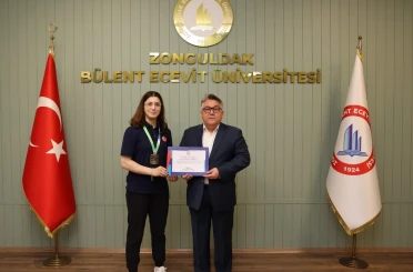 Rektör Özölçer Dünya Şampiyonu Basancı’yı kabul etti 