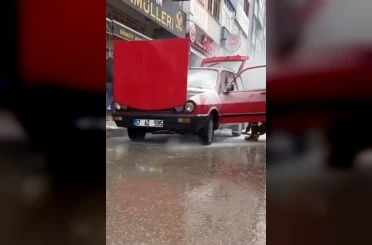 Sinop’ta yanan otomobile esnafın müdahalesi faciayı önledi 