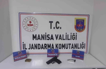 Şüphe üzerine üstü aranan şahıstan tabanca ve mermi çıktı 