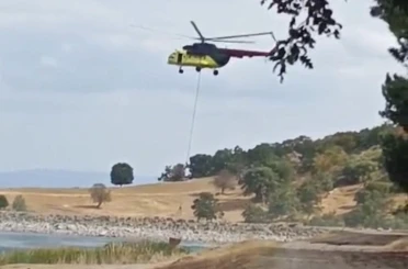 Tavşanlı’da yıldırım düşmesi sonucu çıkan orman yangını havadan müdahaleyle kısa sürede söndürüldü 