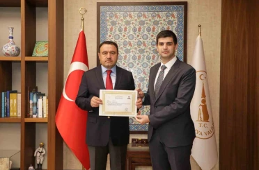Vali Işın’dan Kaymakam Teltik’e başarı belgesi 