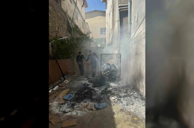 Adana’da polis ekiplerinin müdahalesi yangının büyümesini önledi