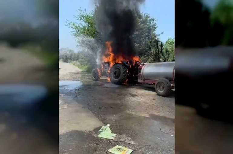Alevlere teslim olan traktörde yaşanan patlama kameraya yansıdı