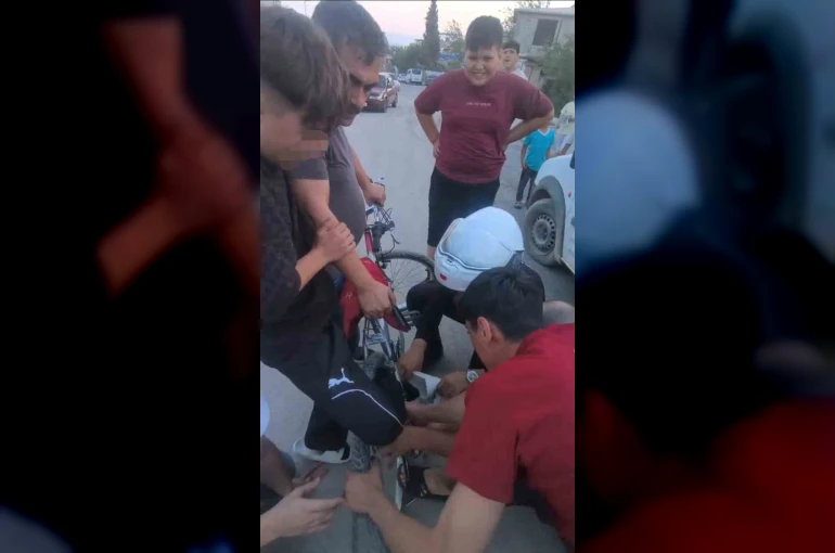 Ayağı bisiklete sıkışan çocuğun yardımına Yunus polisleri yetişti