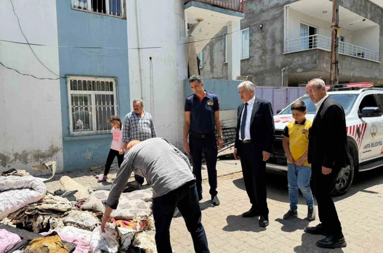 Başkan Hallaç, yangın mağduru aileyi yalnız bırakmadı