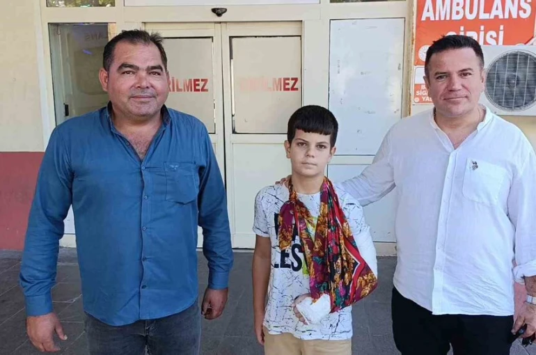 Düşüp kolunu kıran çocuğu aracına alıp hastaneye yetiştirdi