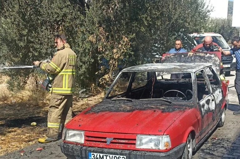 Edremit’te araç yangını otluk alana sıçradı