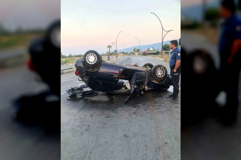 Ters dönen otomobildeki sürücü, sıkıştığı yerden kurtarıldı