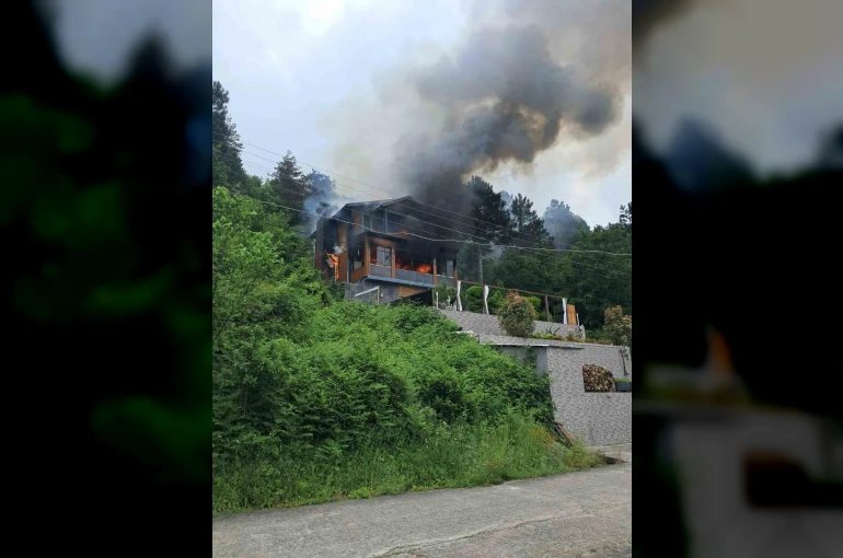 Yangın çıkan villada alevlerin arasında kalan yaşlı kadını ekipler kurtardı